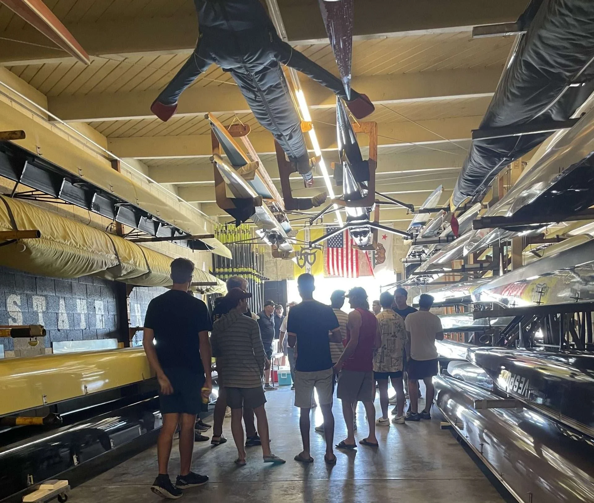 Everyone gathers in the boathouse