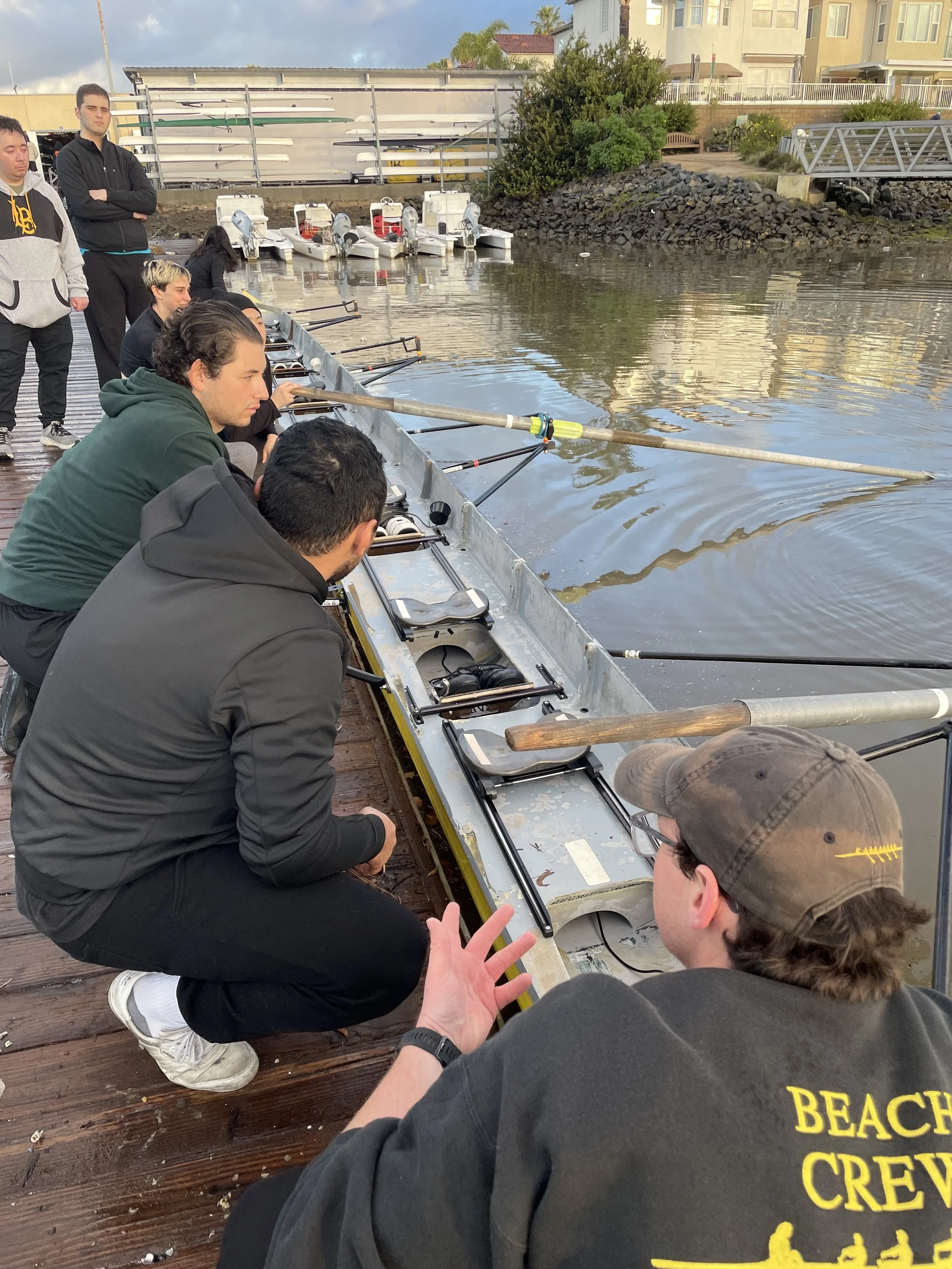 New Recruits being taught how to get in and out of a boat.