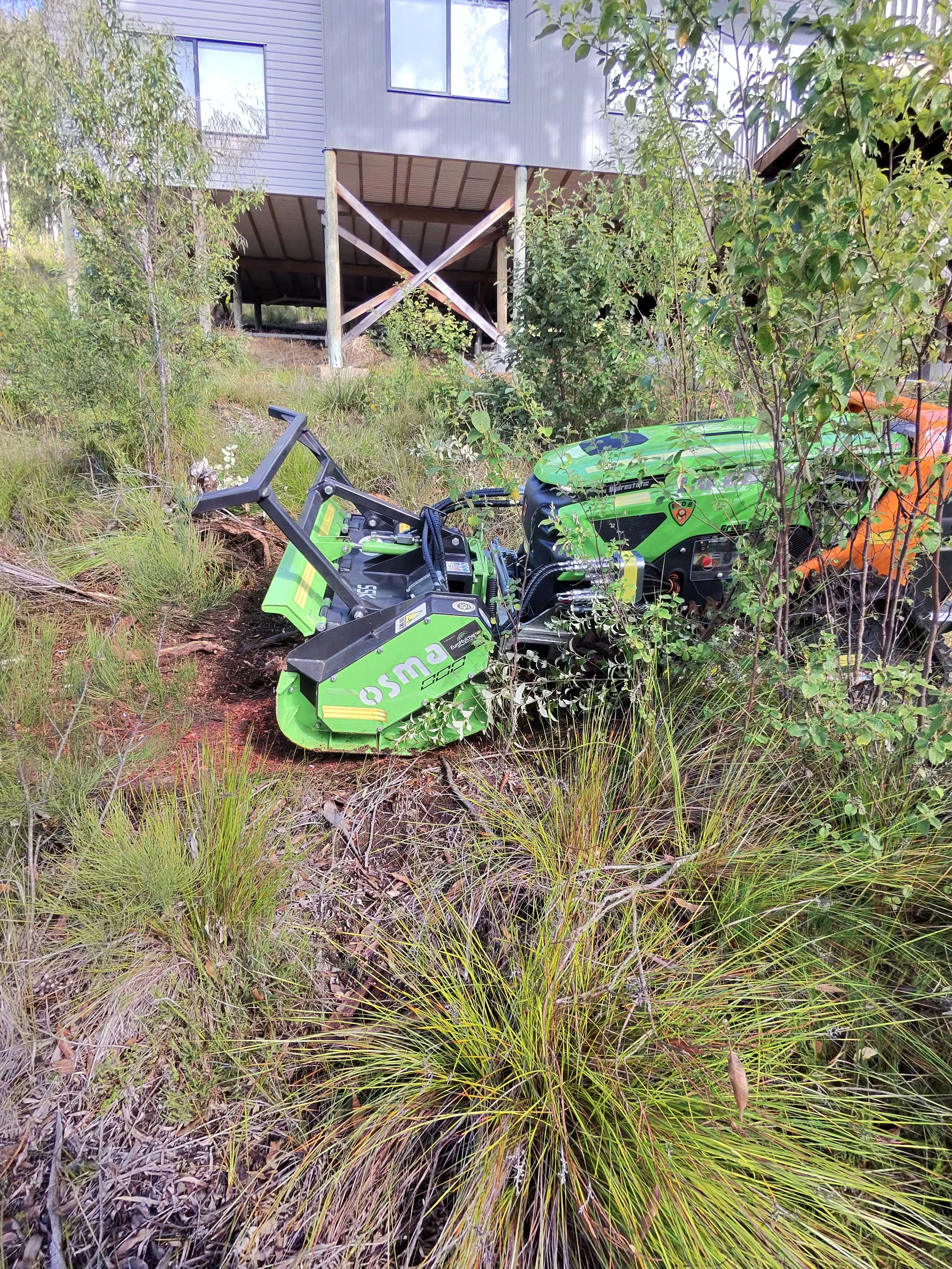 ARC11 remote-controlled mulcher clearing dense scrub, Great Southern WA