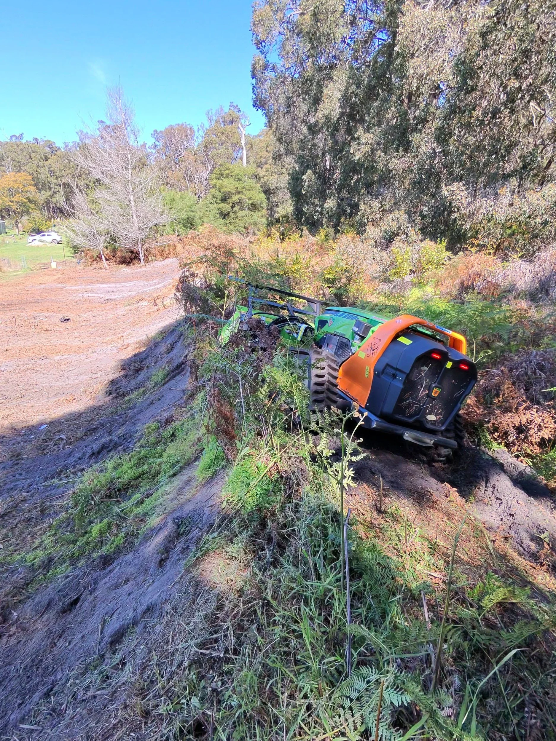 ARC11 remote-controlled mulcher working a steep embankment, Western Australia