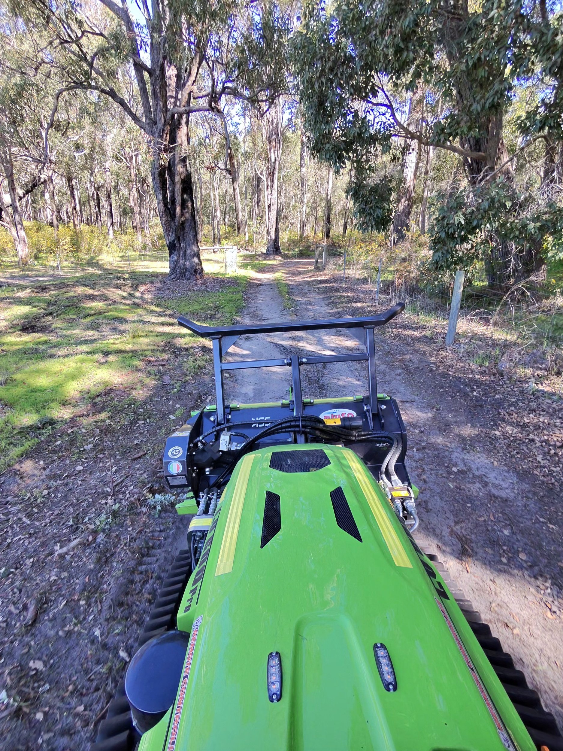 ARC11 remote-controlled machine on a bush firebreak track with the verges cleared — firebreaks servicing Manjimup and Pemberton