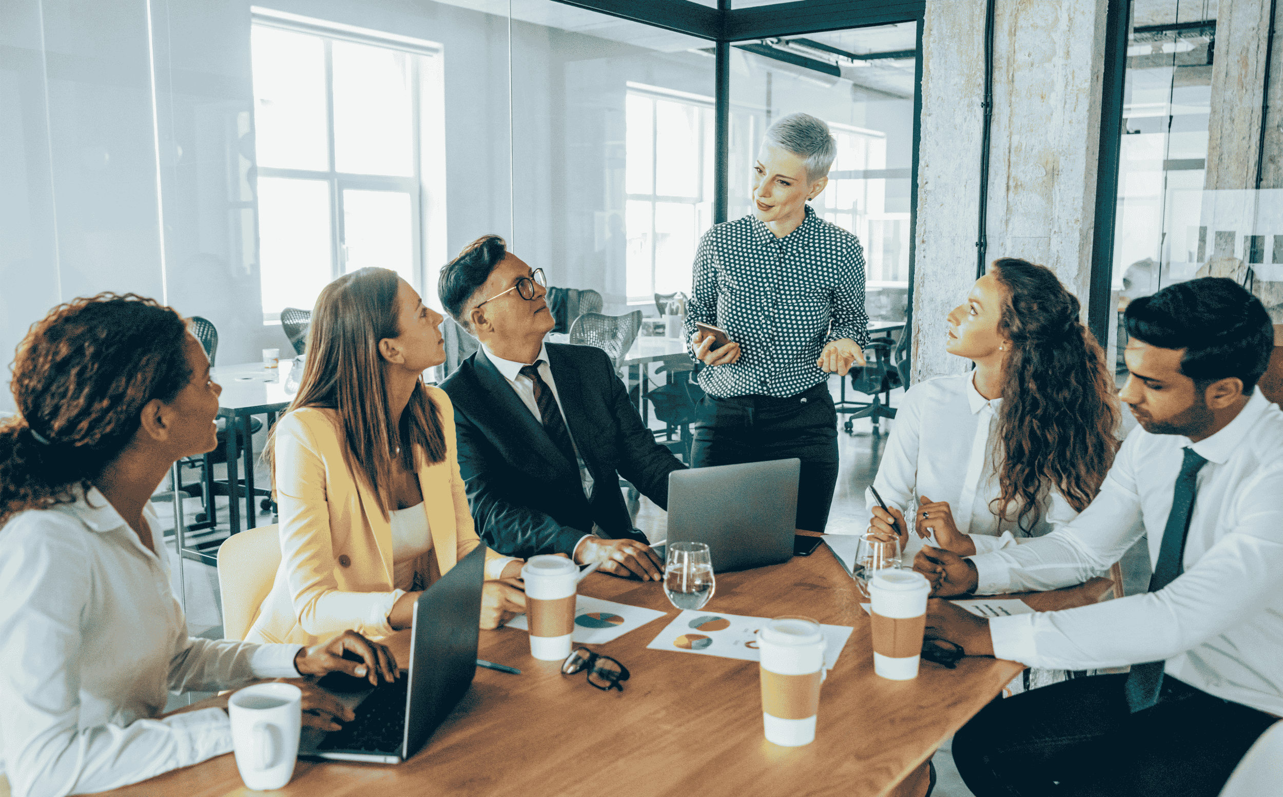 Team celebrating success in a meeting