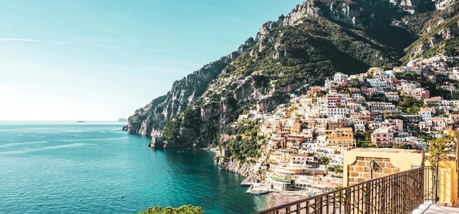 Amalfi Coast honeymoon itinerary — Positano clifftop at golden hour by The Itinerary Architect