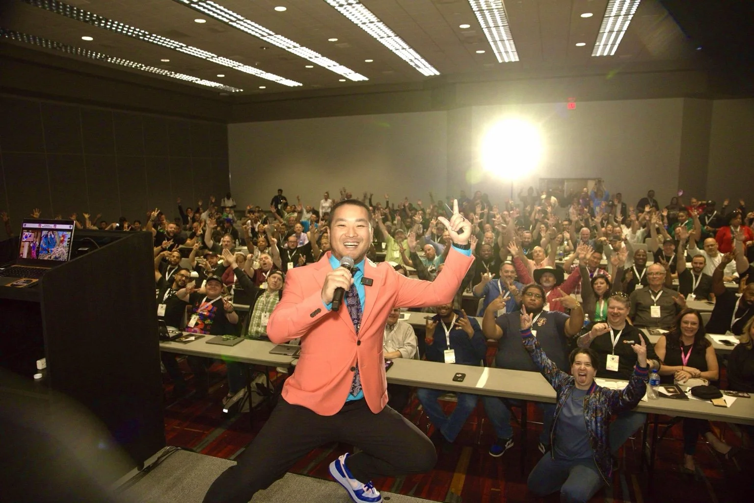 Chris Washburn presenting with an engaged audience at a DJ industry conference