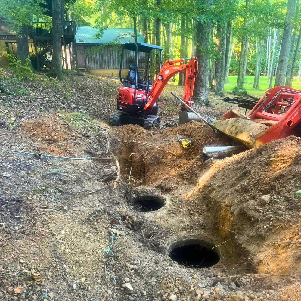 Septic tank installation with a mini excavator in Henry County, TN