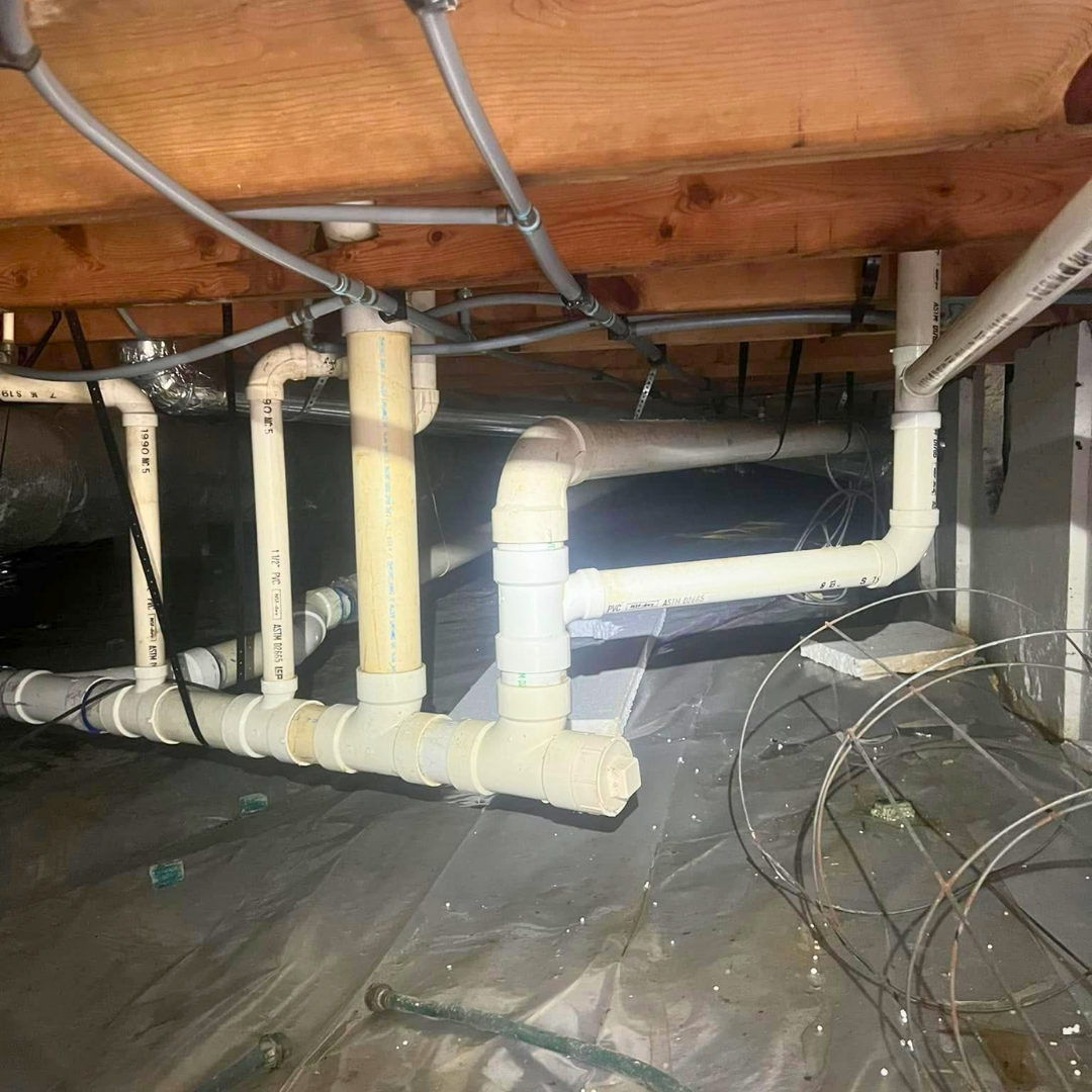 Crawl space drain line repiping
