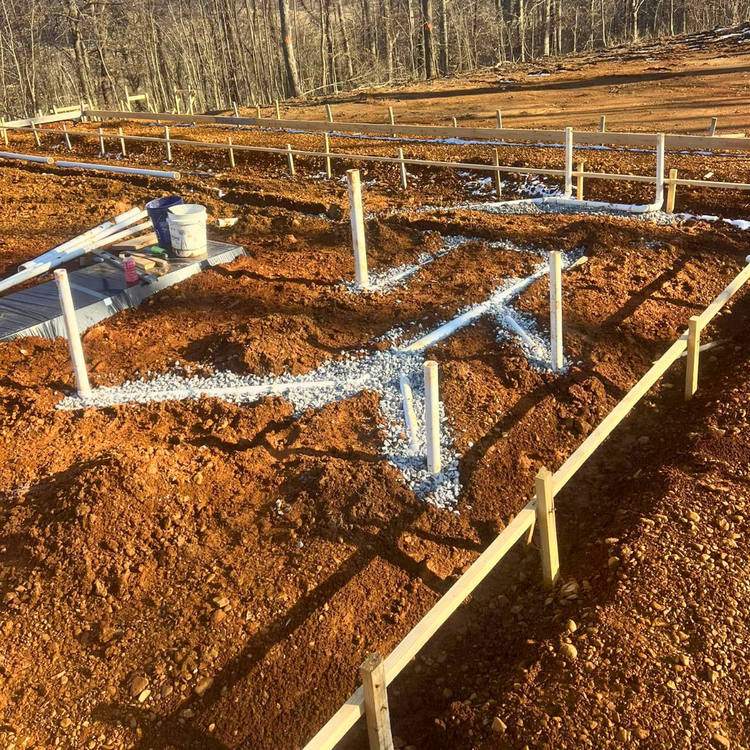 Under-slab plumbing rough-in for new construction