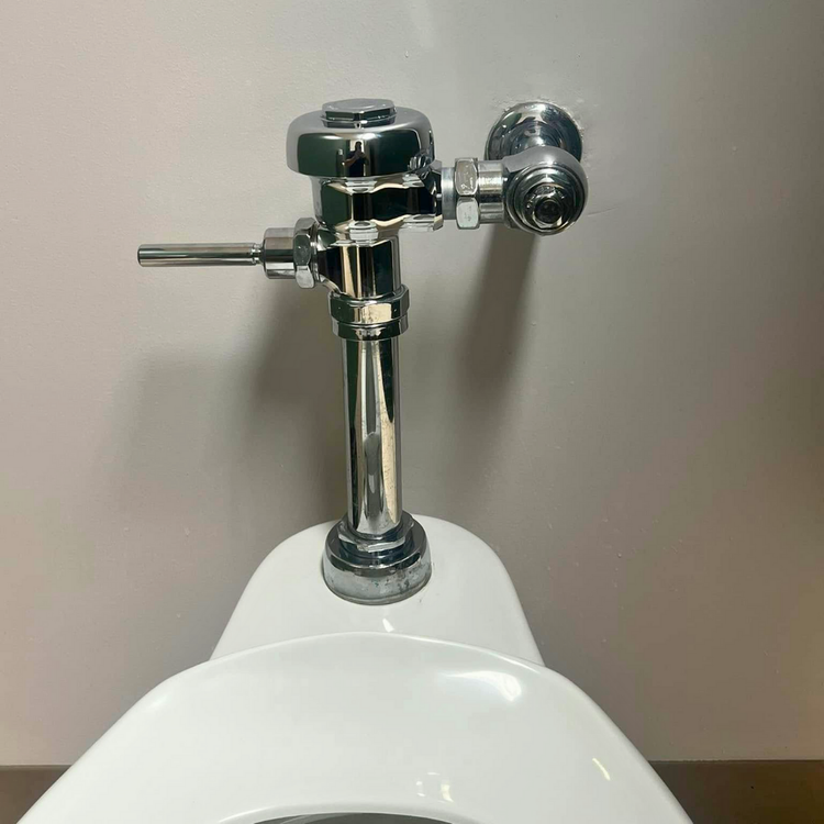 Commercial flushometer toilet plumbing