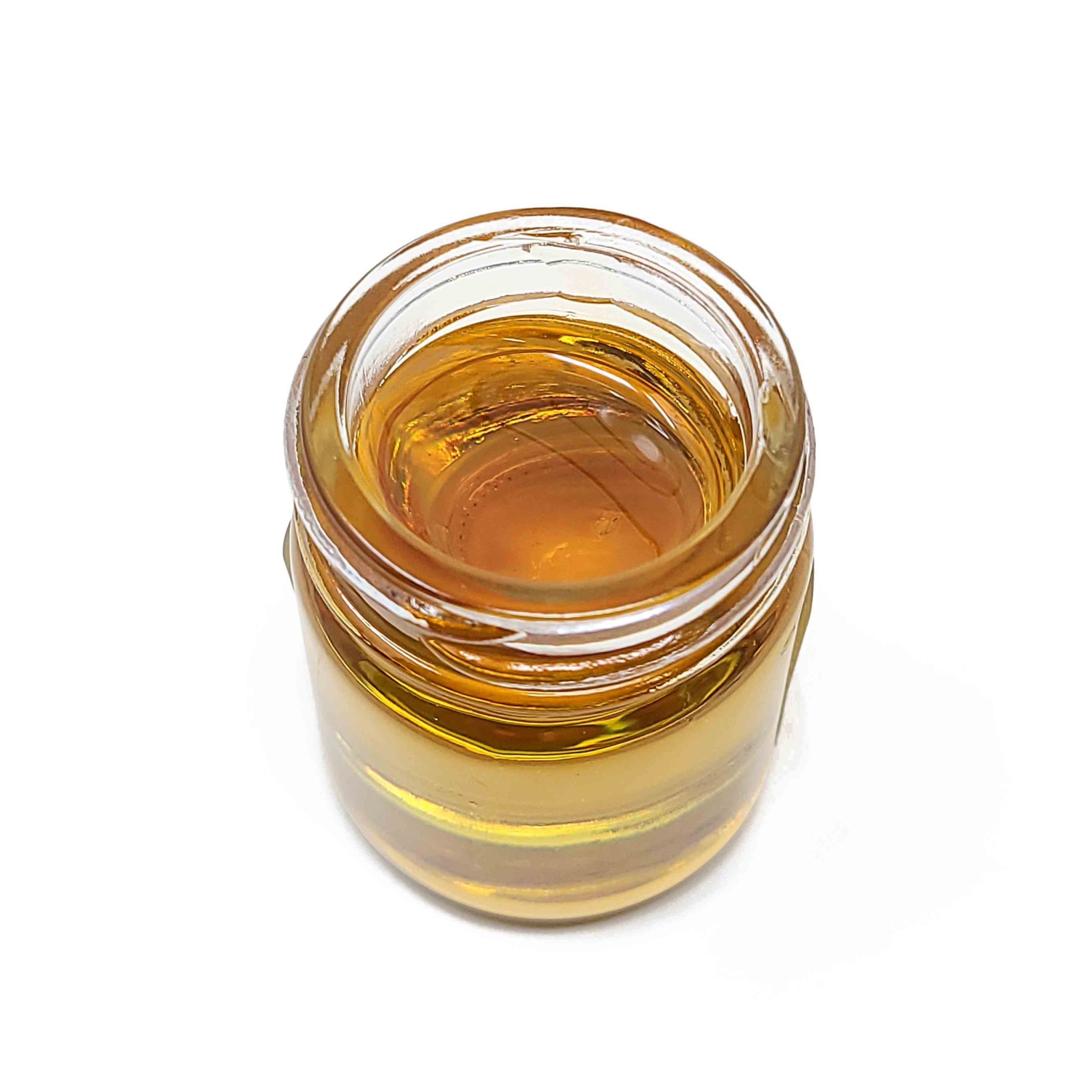 Cannabis distillate — golden, translucent oil
