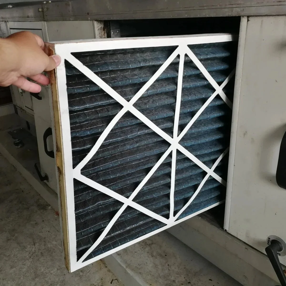 desert stained hvac filter next to new mexico home