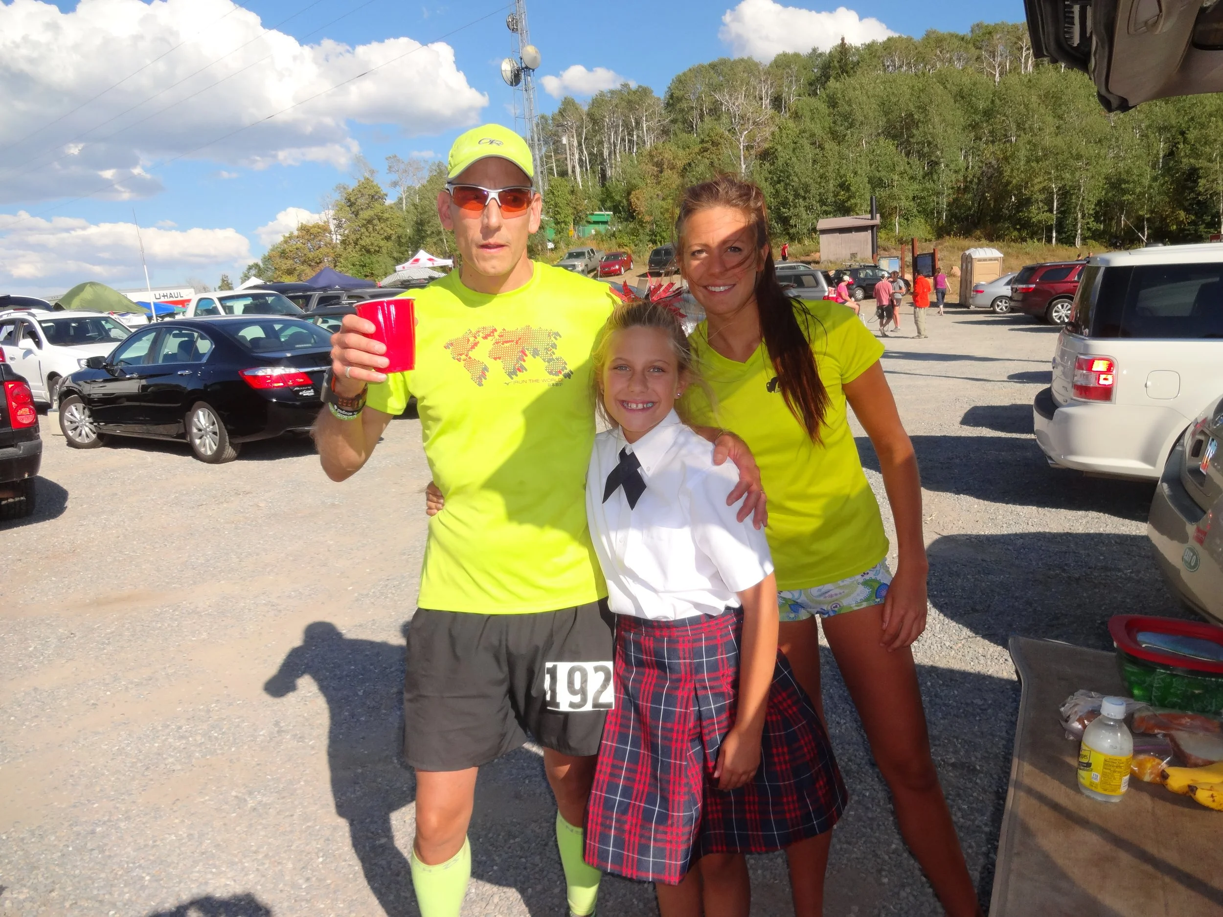 Johnny at an aid station with his daughters