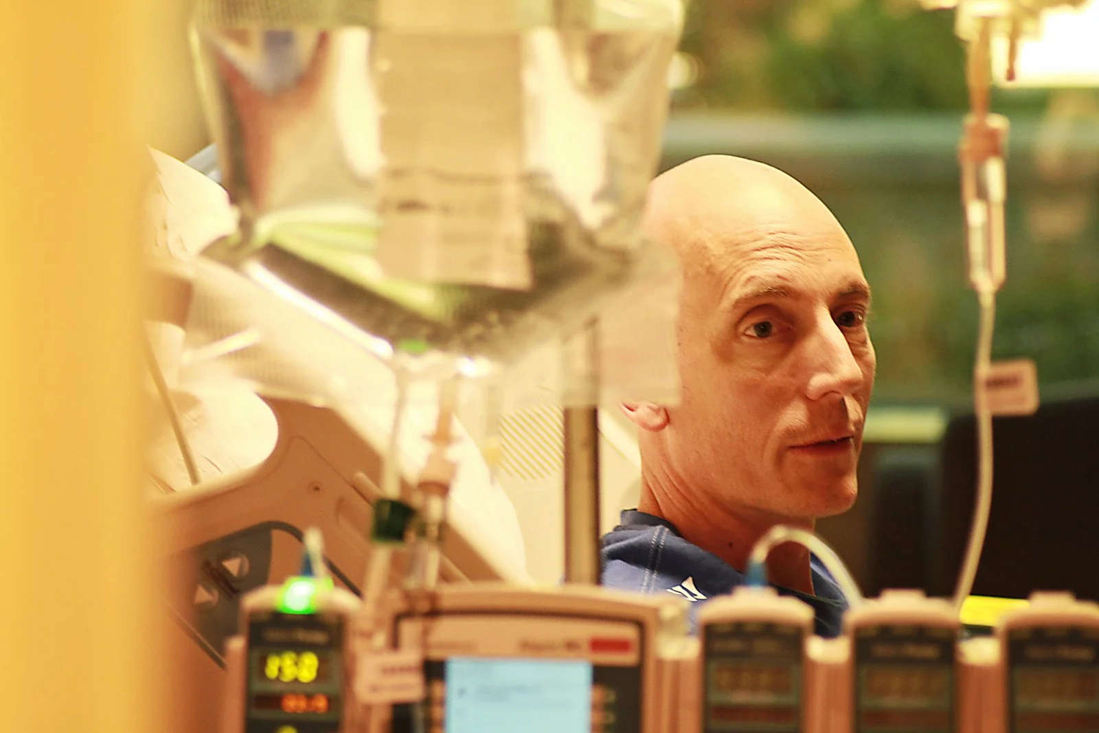 Johnny during chemotherapy with a nurse