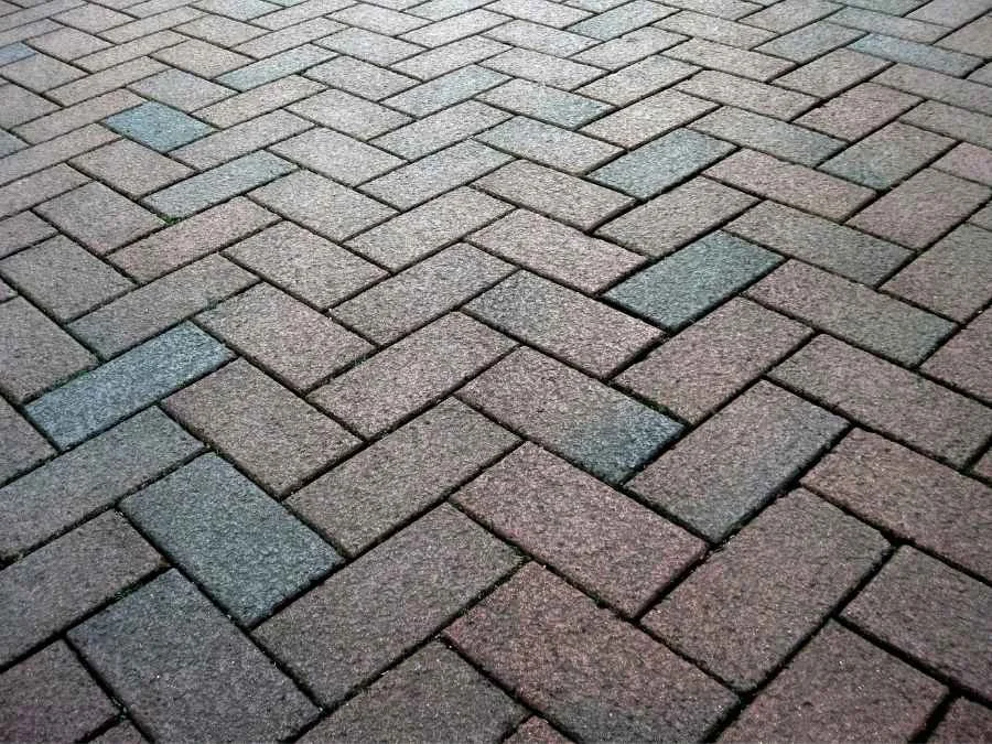 Brick pavers sealed for color enhancement and joint stabilization.