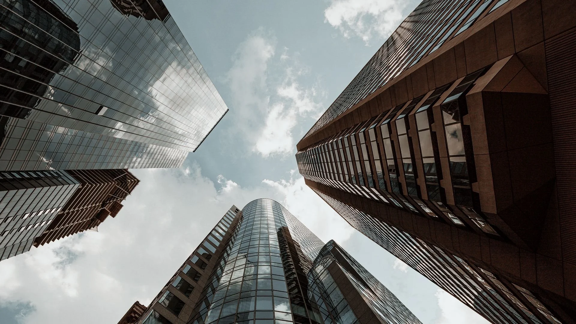 Commercial buildings looking skyward — low doc commercial property loans