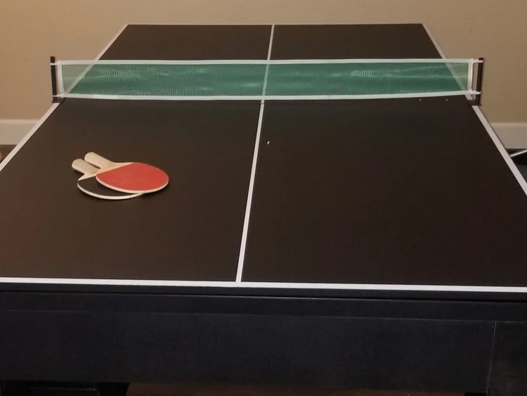 Pool table with a ping pong top, assembled in a Phoenix game room