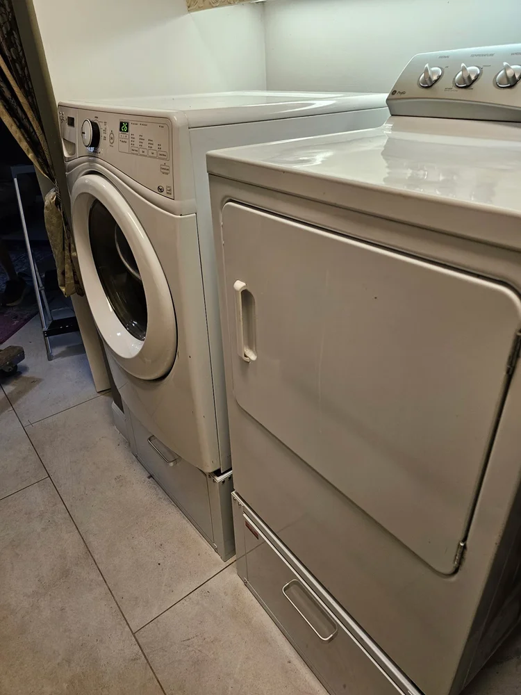 Washer and dryer pair set in place in a Phoenix laundry room