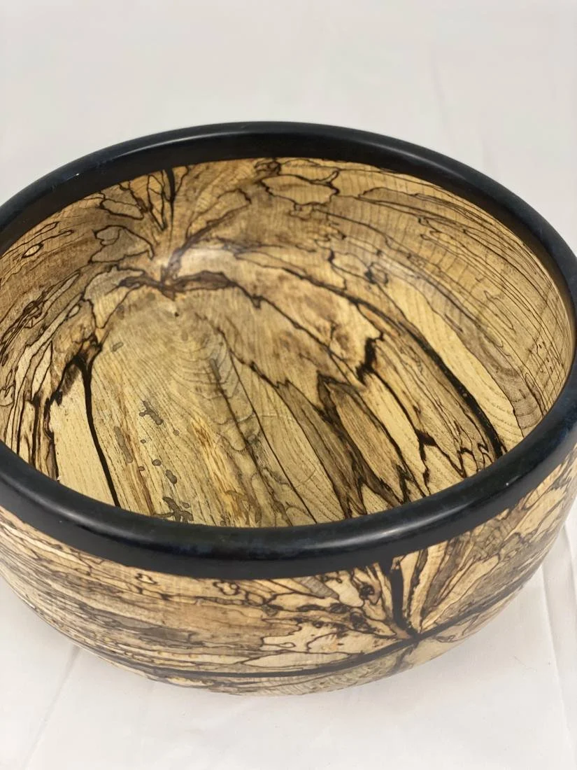 Spalted hackberry bowl with a black resin rim