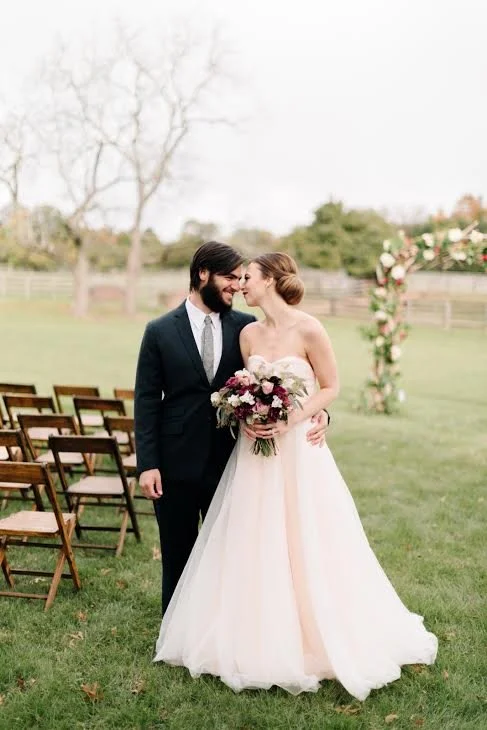 Vintage wooden folding chairs arranged for a rustic indoor wedding ceremony at Brooklyn Winery in Williamsburg, Brooklyn