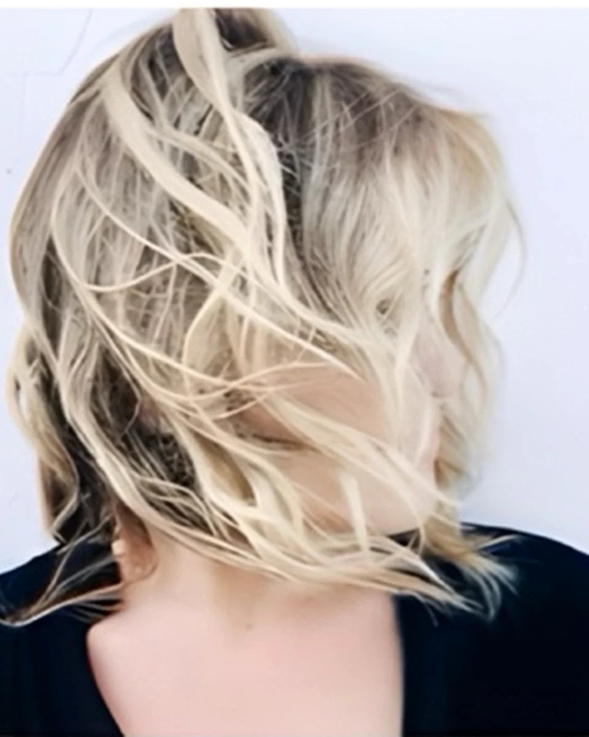 Textured platinum blonde bob created at MMA SALON