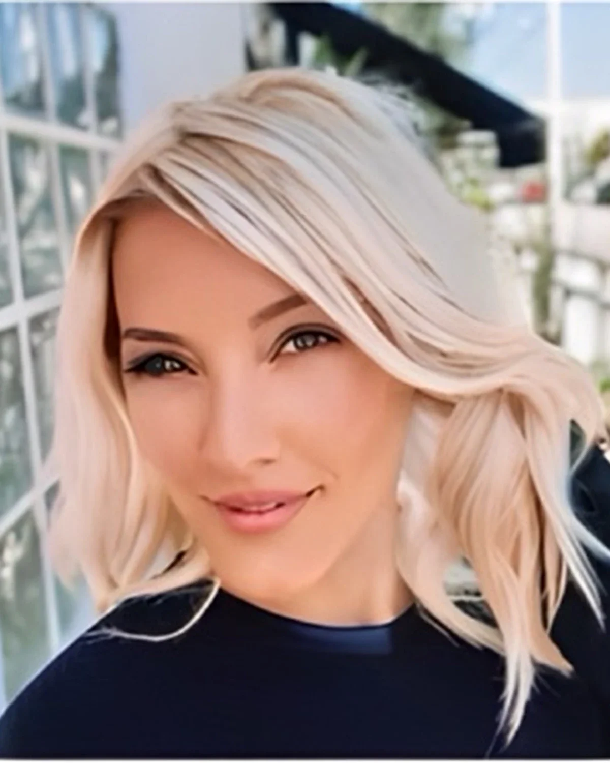Modern platinum lob created at MMA SALON Miami Beach