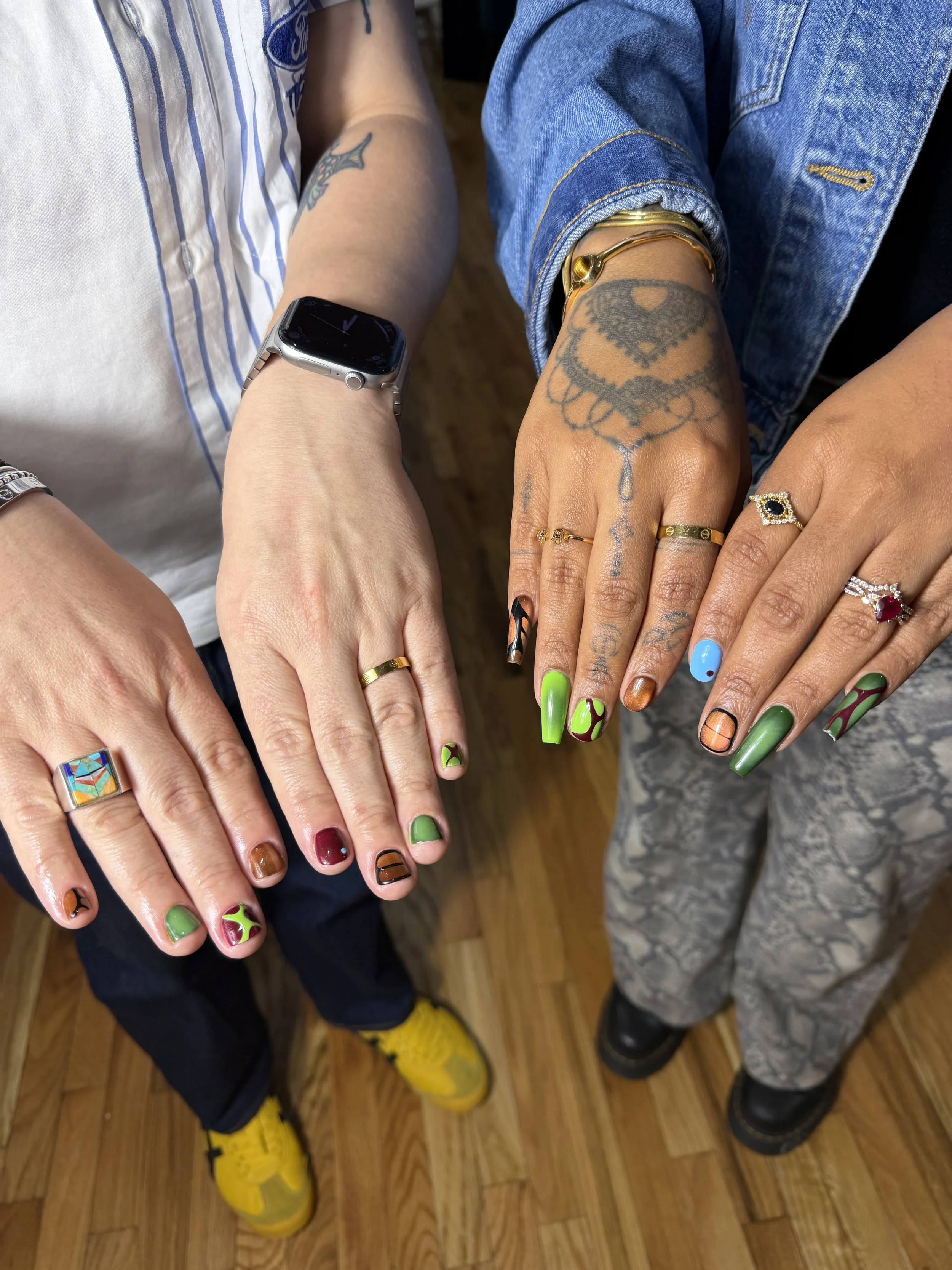 Two hands side by side showing nail art from Haus of Femme