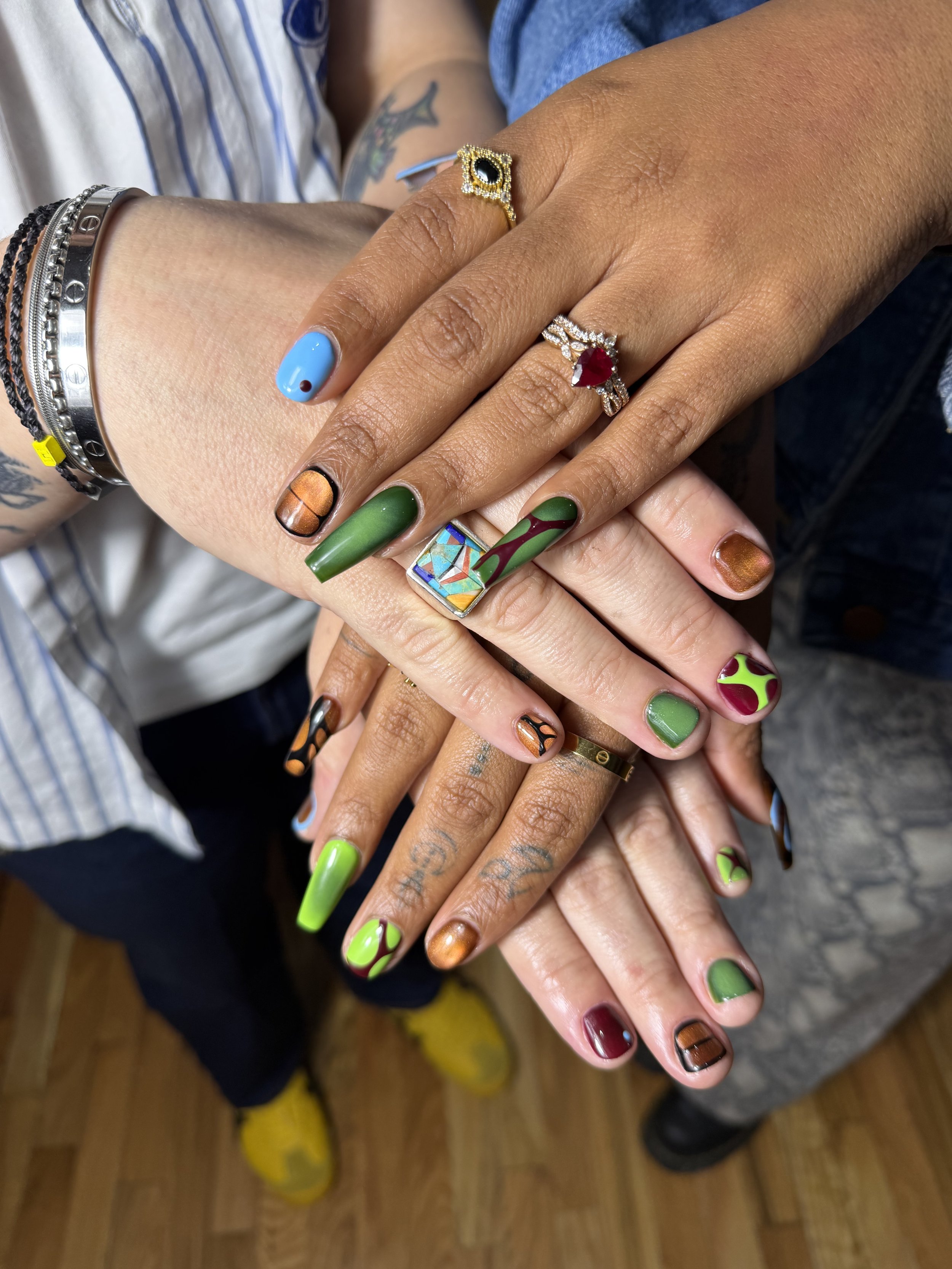 Hands clasped showing full nail set from Haus of Femme