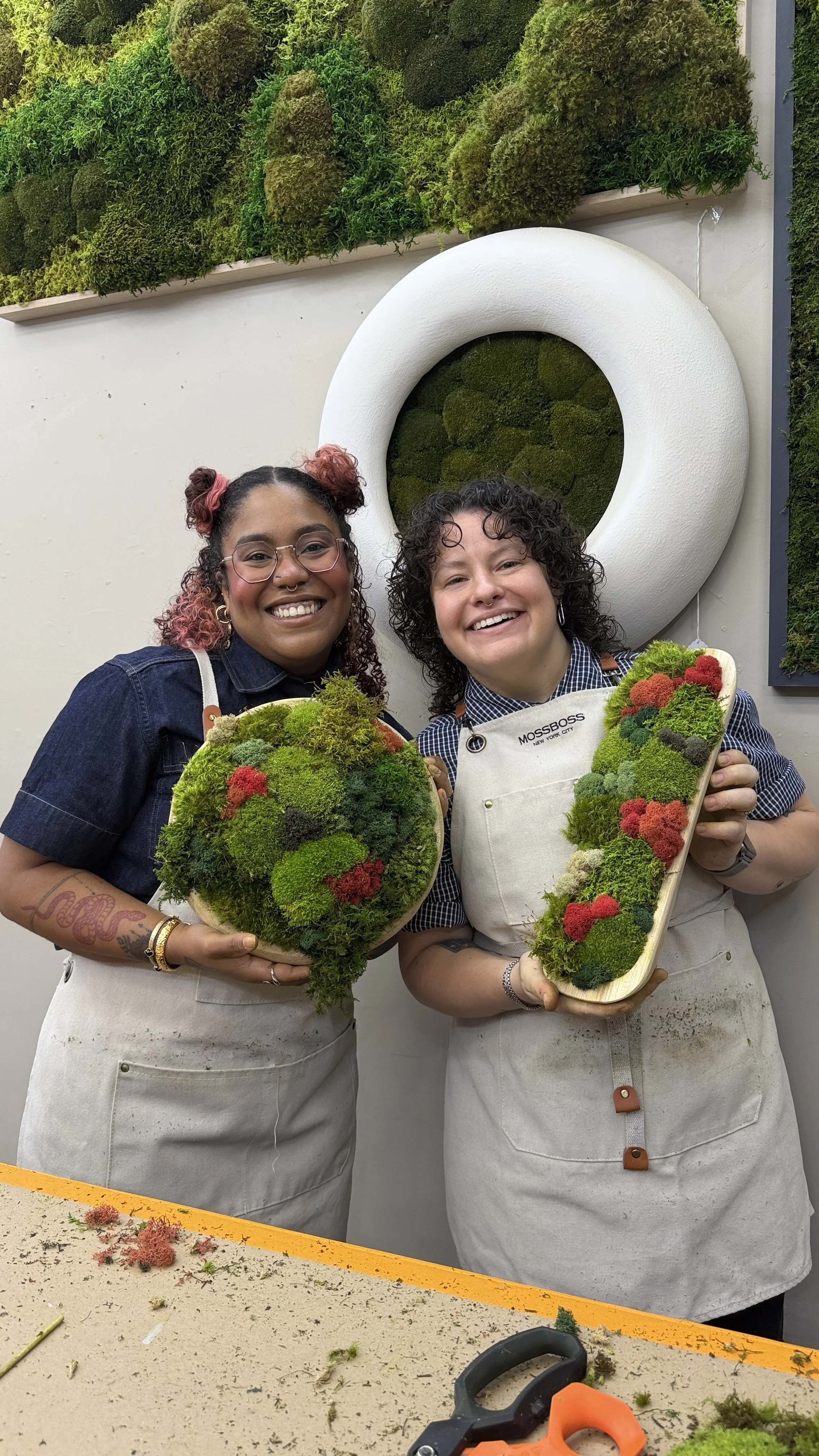 Kate and Vicky holding finished moss bowls at MossBoss NYC