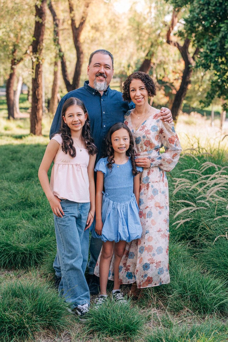 A family together at golden hour during a Picture Book session in Orange County