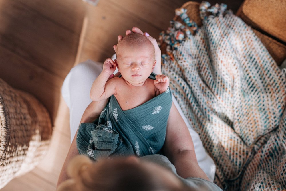 Newborn baby at home during a natural lifestyle session