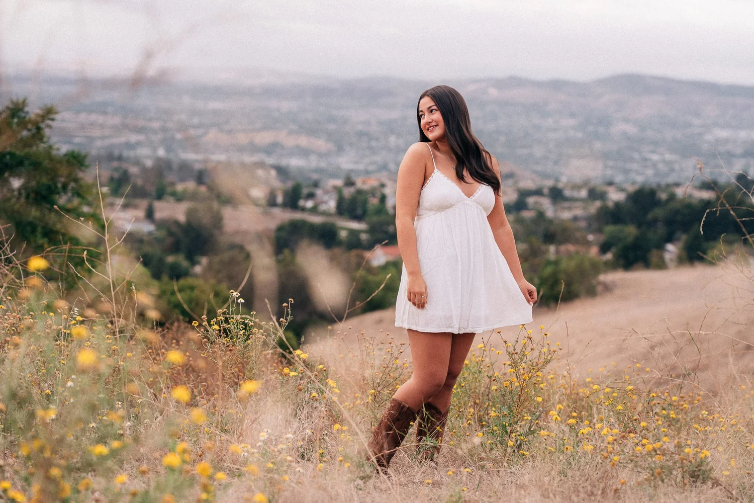Charlotte in the wildflowers at Weir Canyon, Anaheim Hills, during her senior session