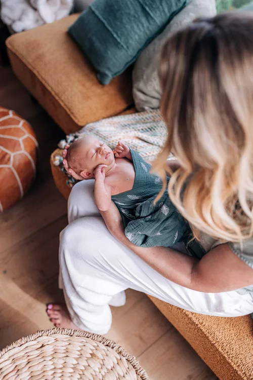 A moment from the Davis family's in-home newborn session in Orange County