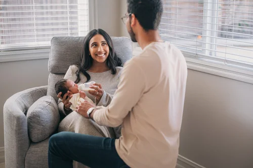 A moment from the Ganesh family's in-home newborn session in Long Beach