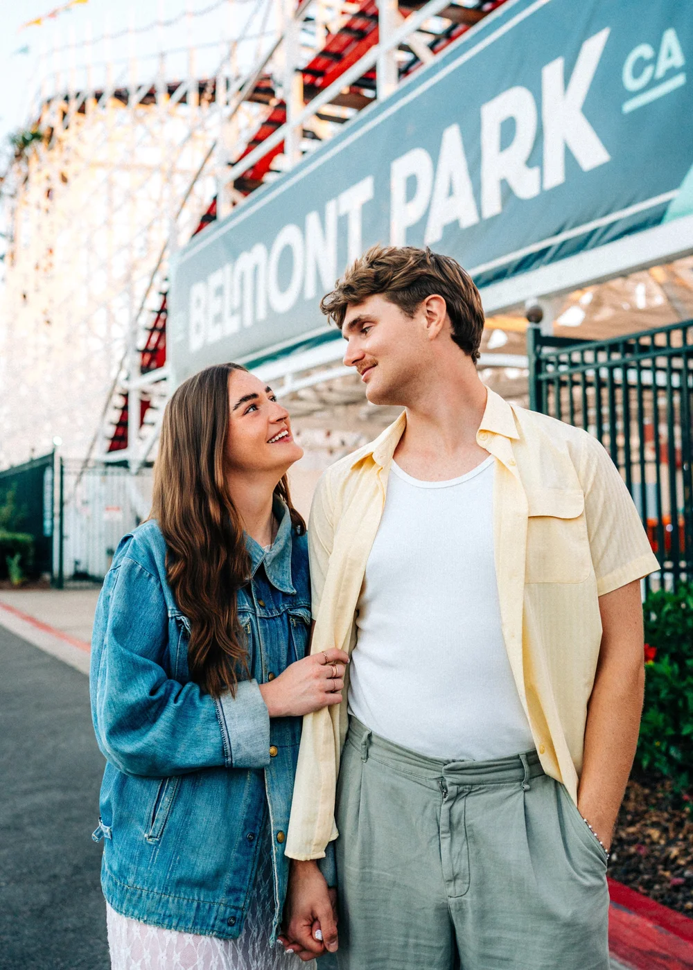 A couple walking together at golden hour during a Double Feature session in Orange County
