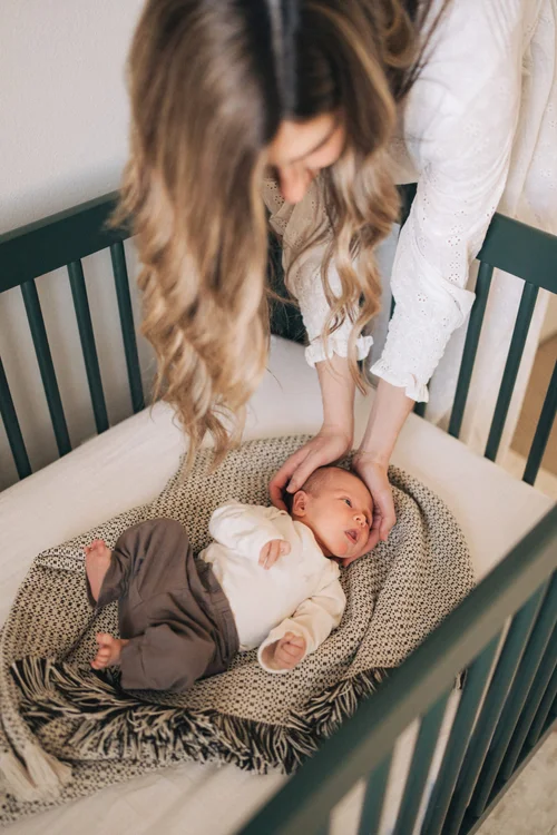 A moment from the Hunter family's in-home newborn session in Rancho Mission Viejo