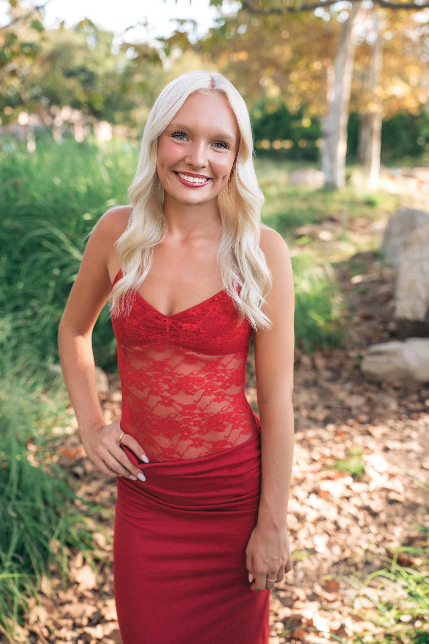 Laila in a red dress on the Jeffrey Open Space Trail