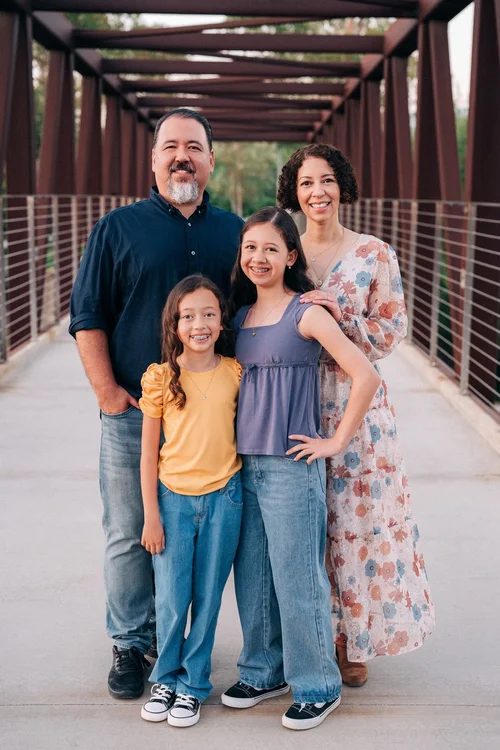 The Slemmons family together on the bridge at Jeffrey Open Space Trail in Irvine