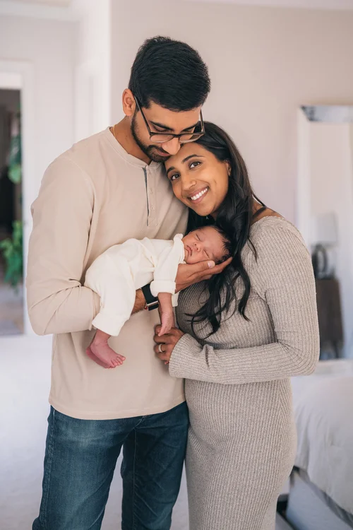 A moment from the Ganesh family's in-home newborn session in Long Beach