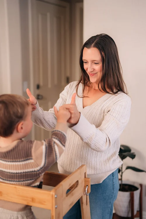 Mom holding her son at home during the Palladino in-home session in Irvine