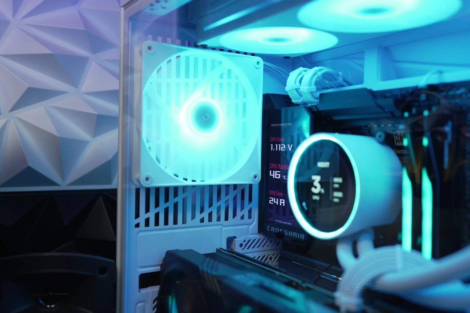 A close view of a DLB PC's illuminated rear fan, top fans and CPU cooler.
