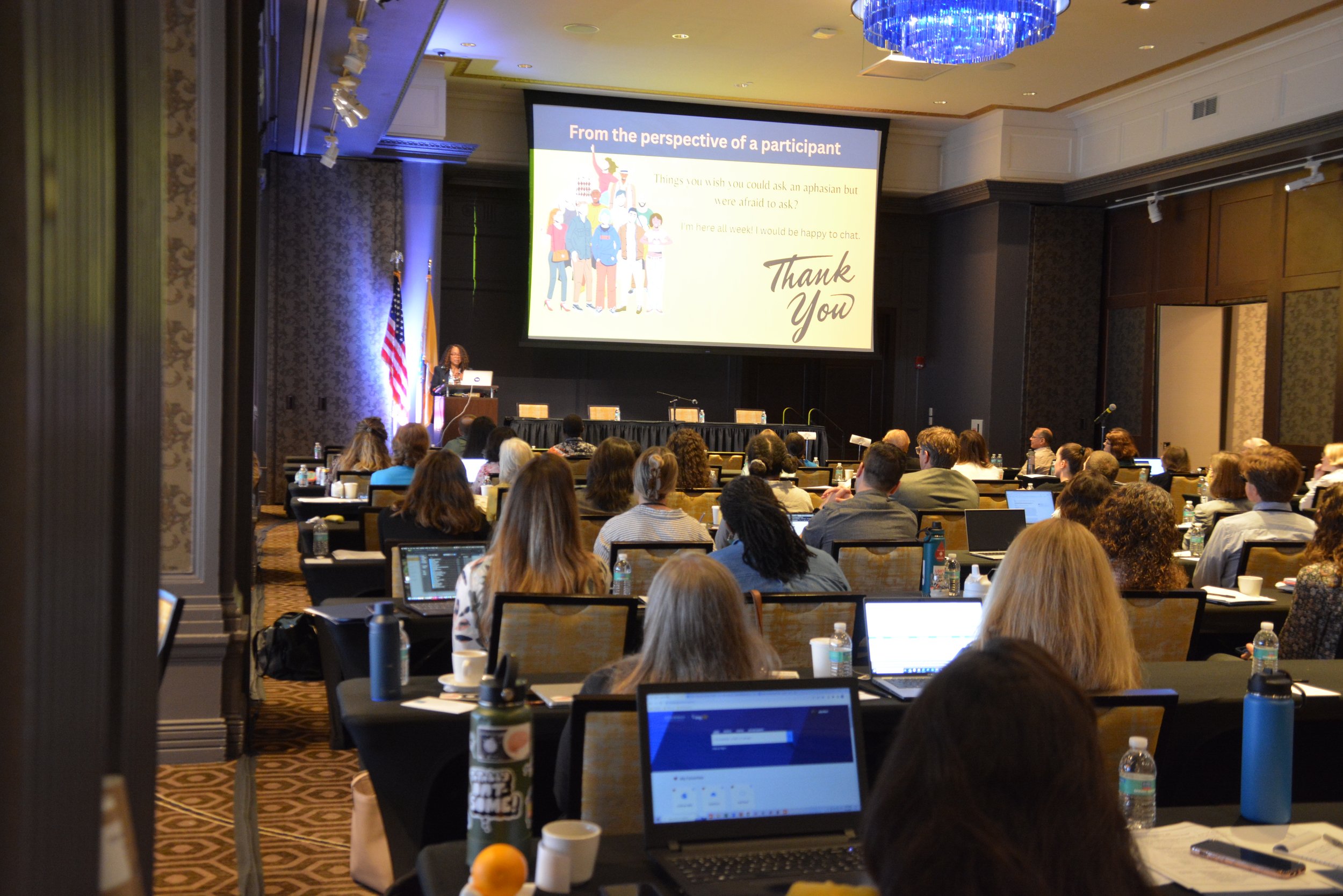 Angelique Cauthorn speaking to a conference audience