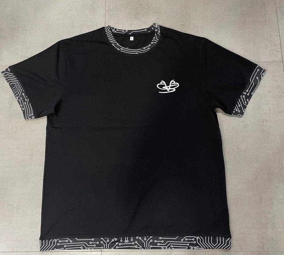 Black T-shirt sample with white circuit-pattern details around the neckline, sleeve ends, and hem