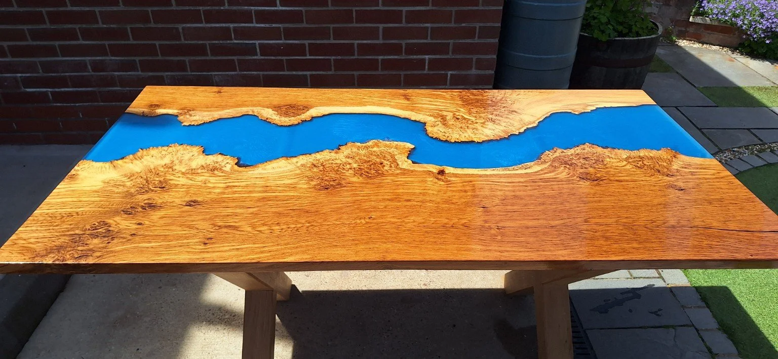 Top view of the Oakline timber and blue resin dining table