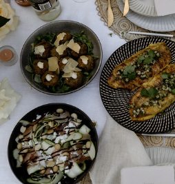 Shared wedding dishes ready for guests to enjoy together.