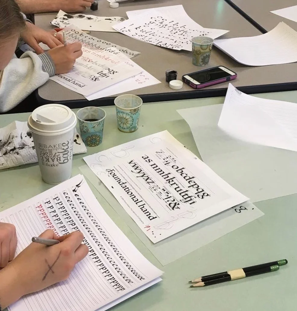 Student practicing Copperplate calligraphy