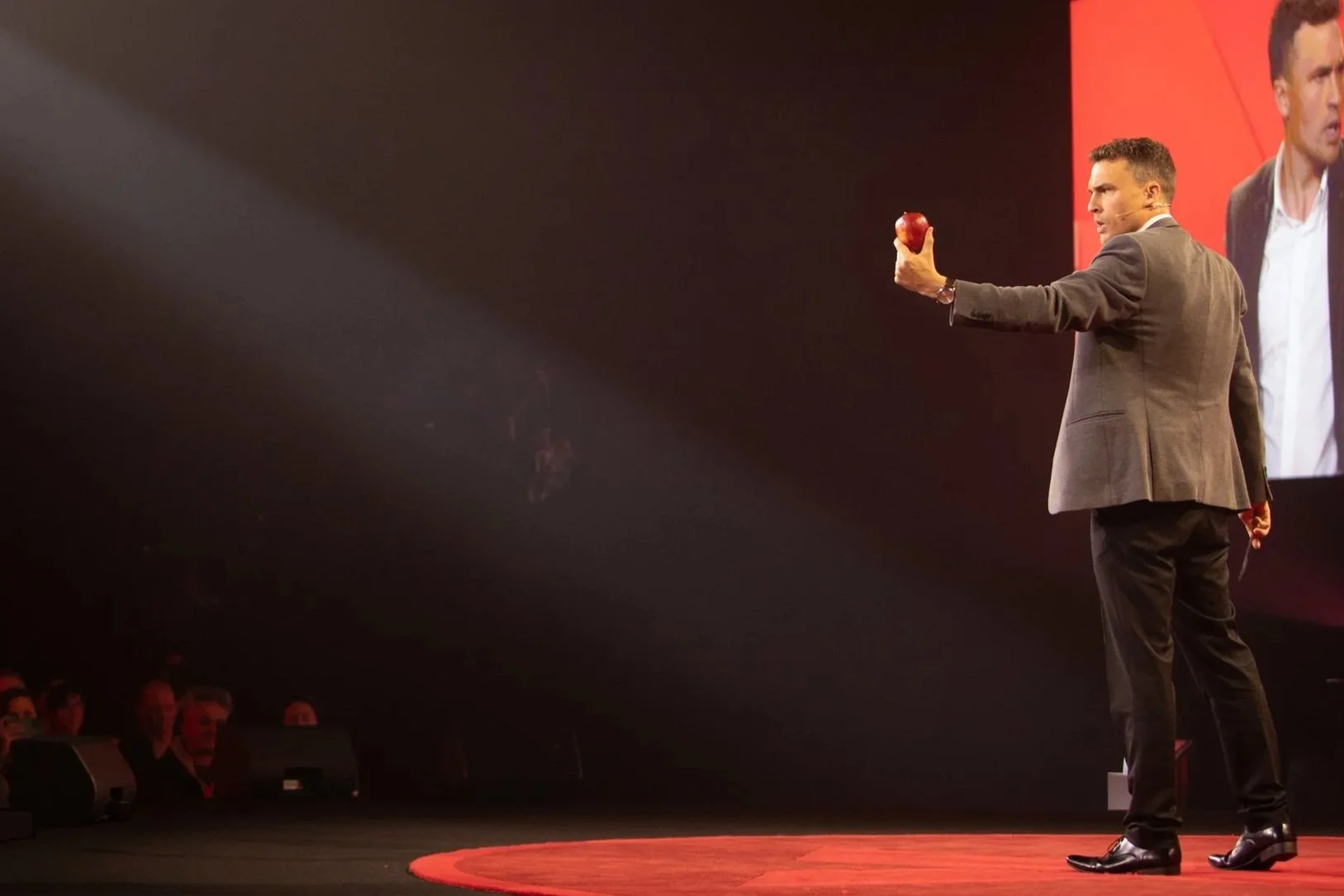 Andy Nunn entertaining a corporate conference audience