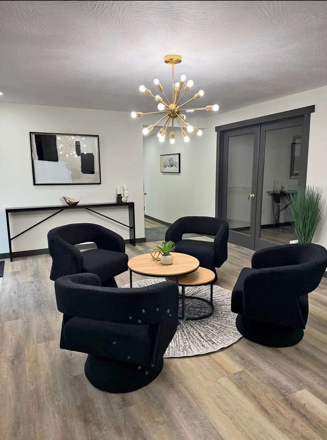 The Solace Spaces waiting area with chandelier