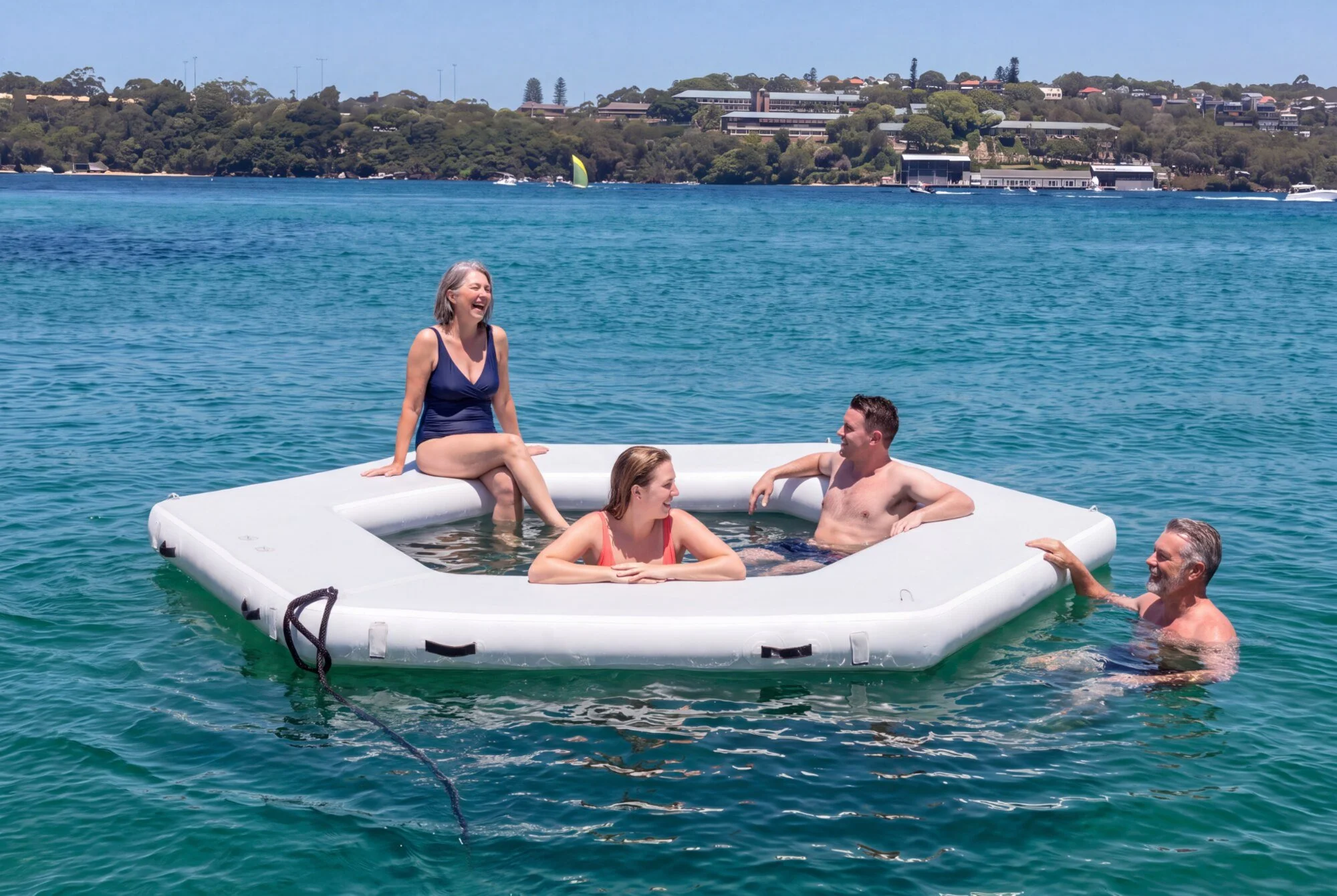 Guests enjoying Opal's inflatable splash pond