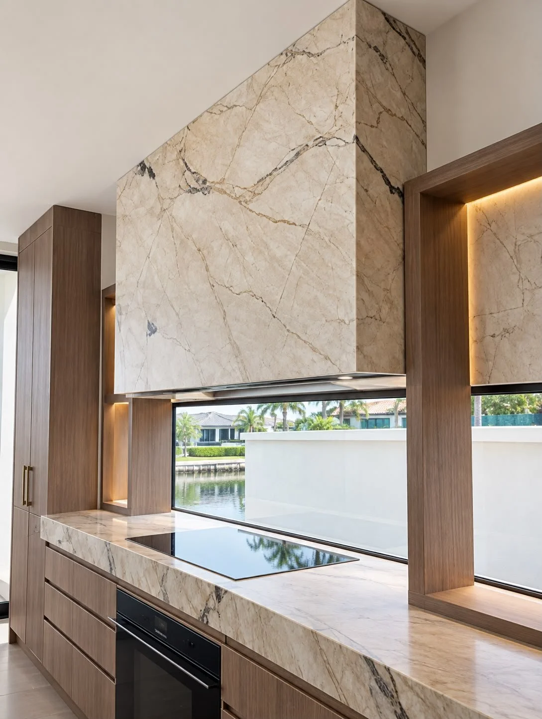 Stone rangehood and timber kitchen joinery