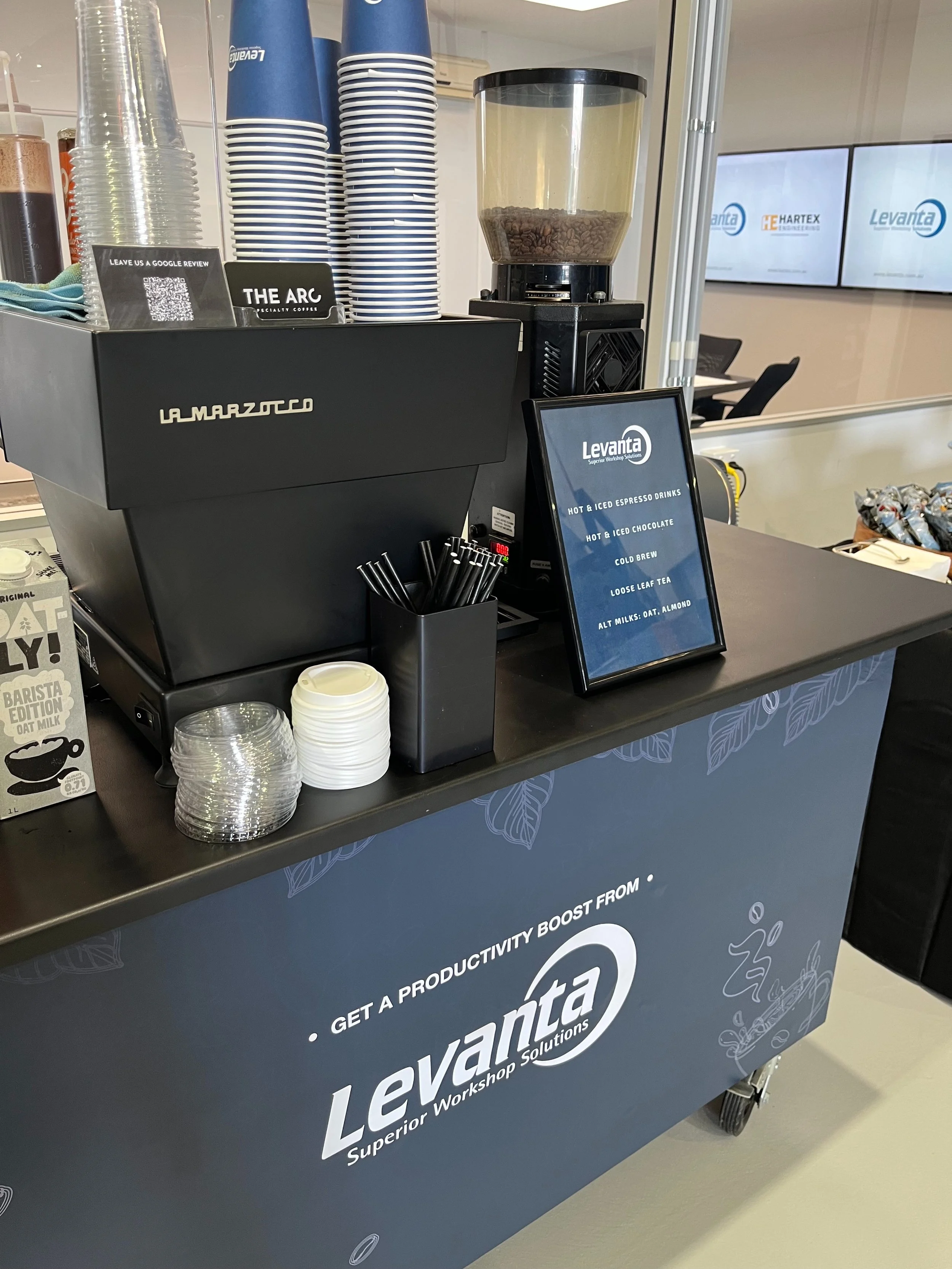 Branded coffee cart at a corporate event