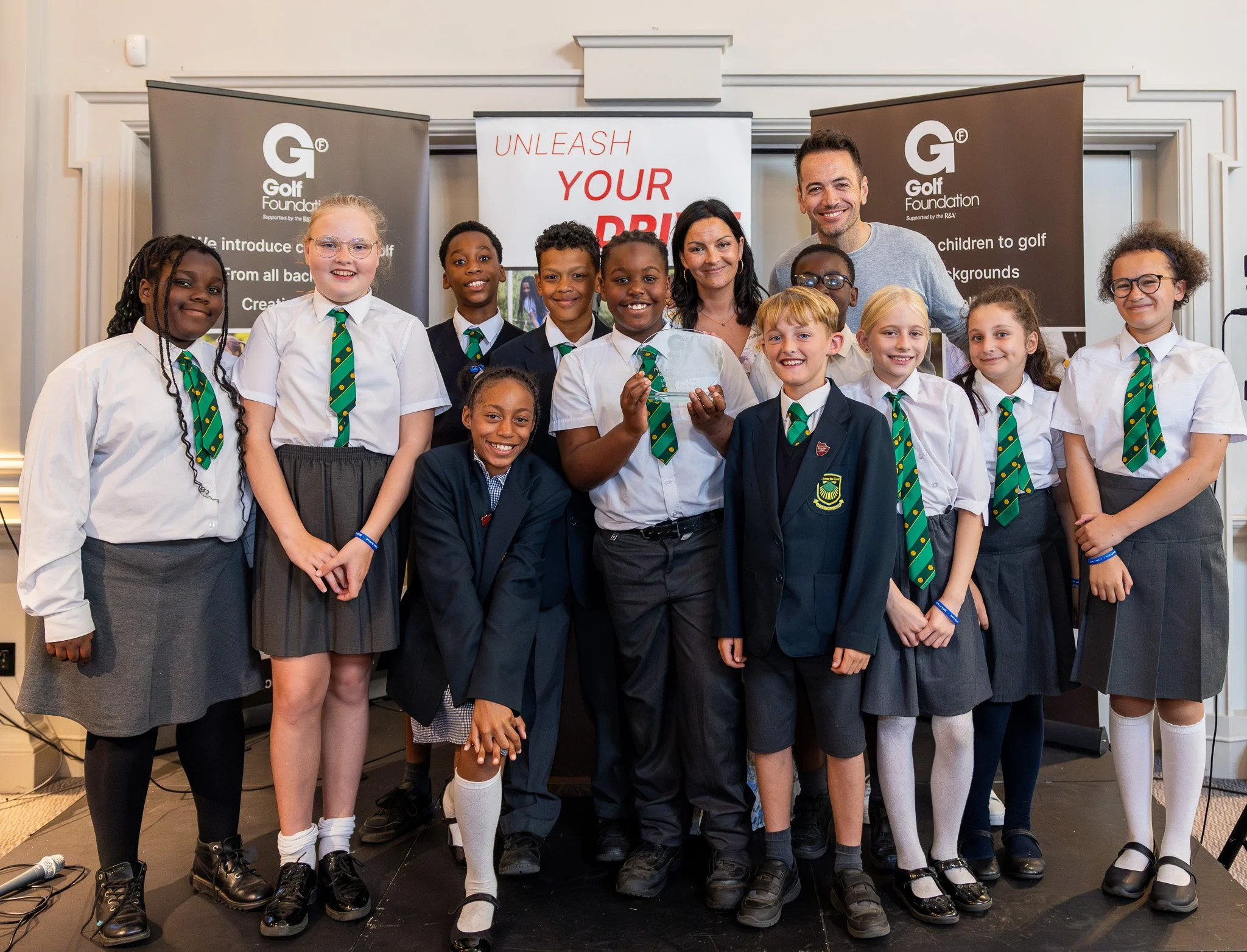 Presidents Awards winners from St James the Great, an Unleash Your Drive school, celebrating with their award